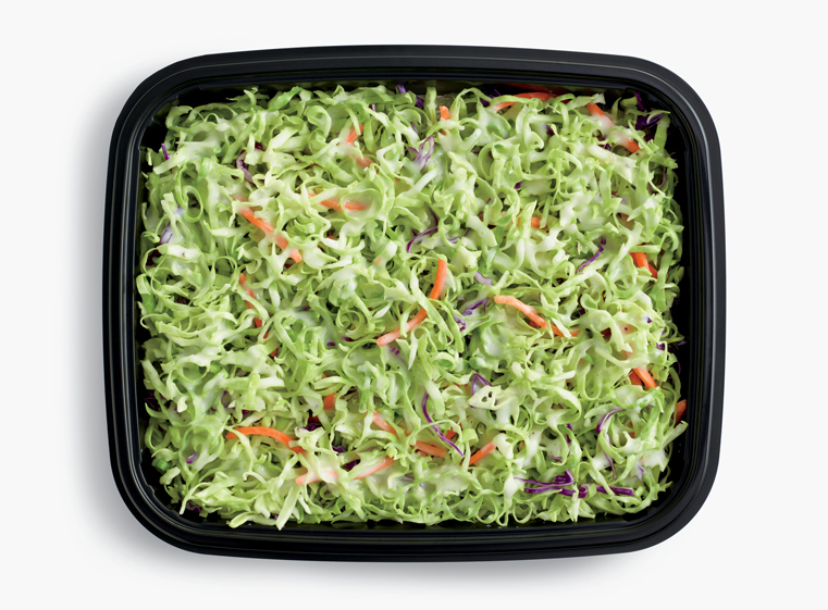 Open catering container of fresh coleslaw