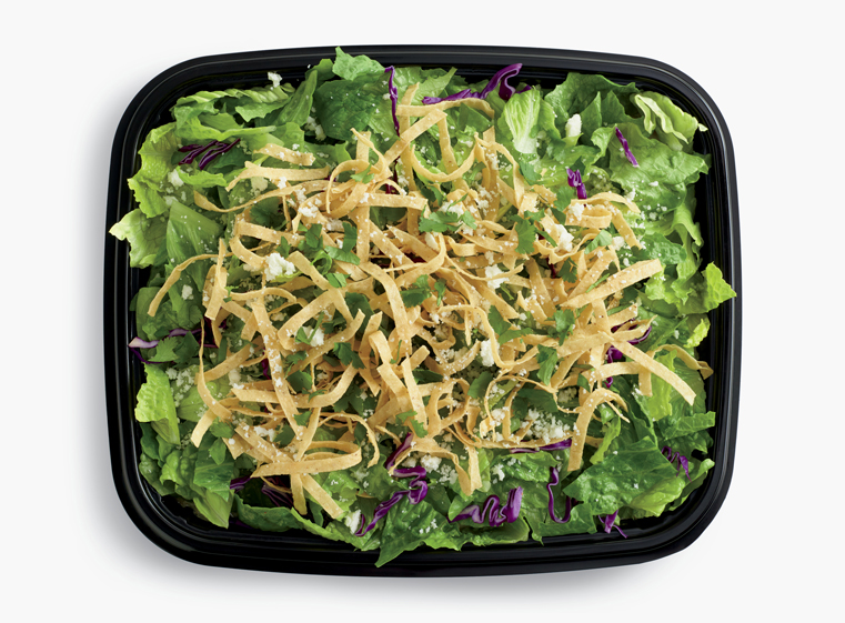 Open catering container of Loco Salad with tortilla strips