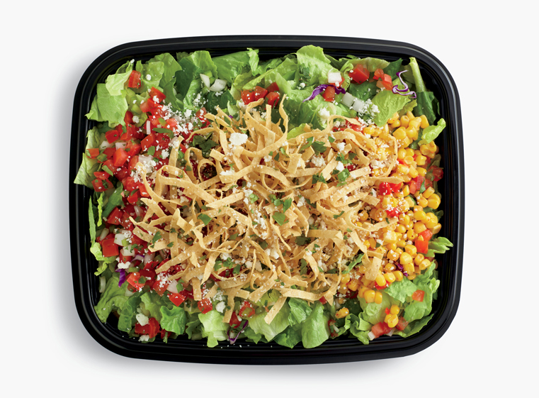 Open catering container of signature Mexican Salad