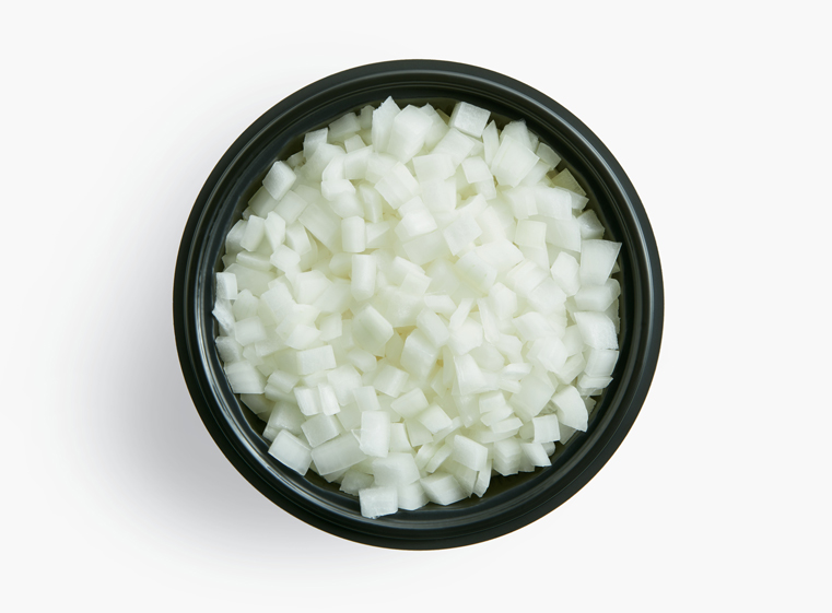 Open container of freshly chopped onions