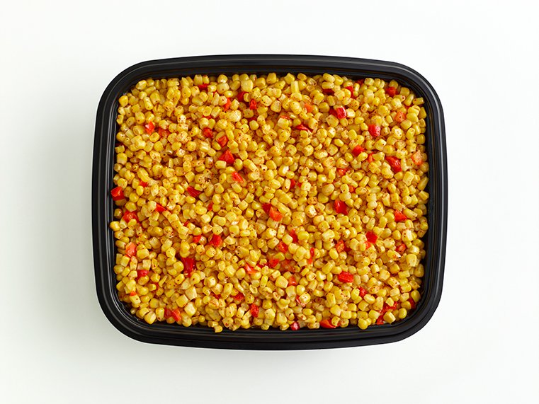 Open catering container of cut corn