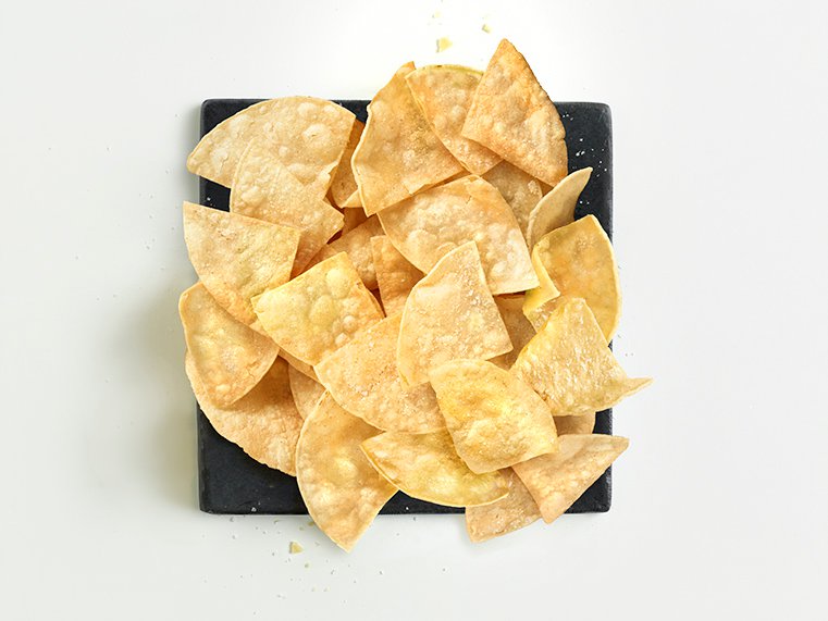 Tortilla chips served on plate